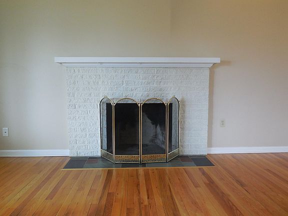 Dreamy brick wood burning fireplace