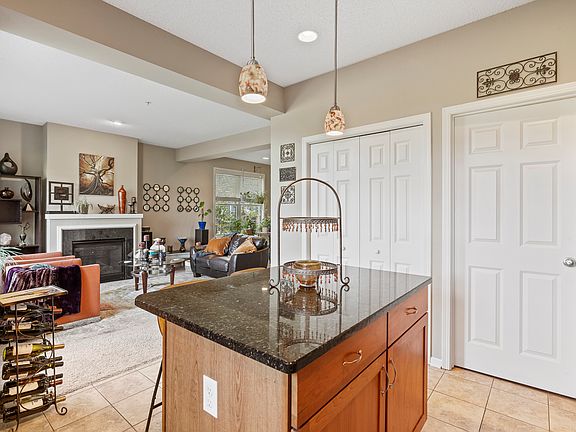 Kitchen opens to the family room and informal dining.