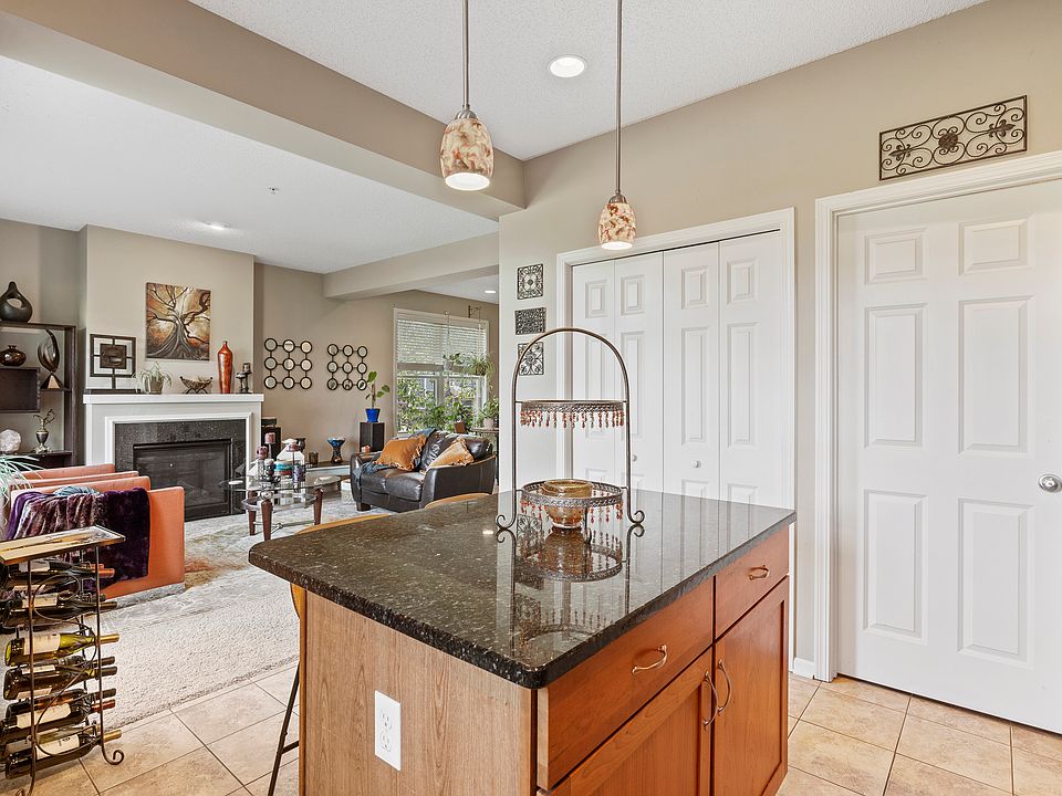 Kitchen opens to the family room and informal dining.