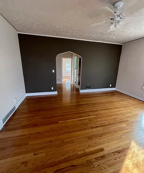 Living room. Very large and beautiful hardwood floors.