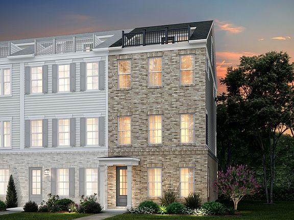 Broxton Exterior 72 features brick, James Hardie TM siding, covered front door, terrace and 2 car r