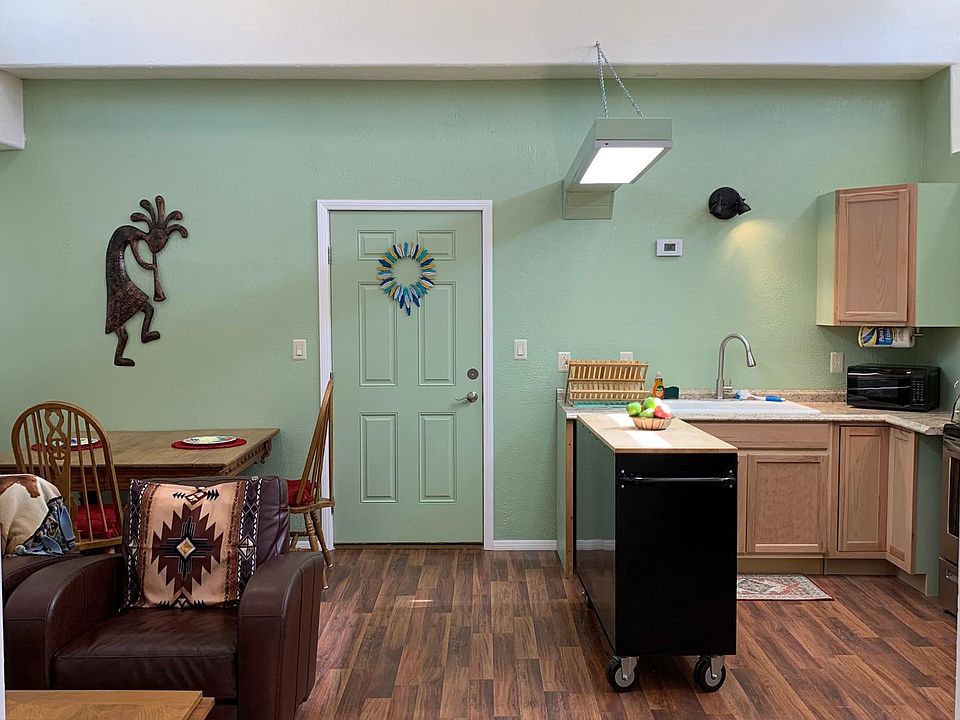 Beautiful Open Living, Dining, and Kitchen space. High Ceilings. Lots of natural light.