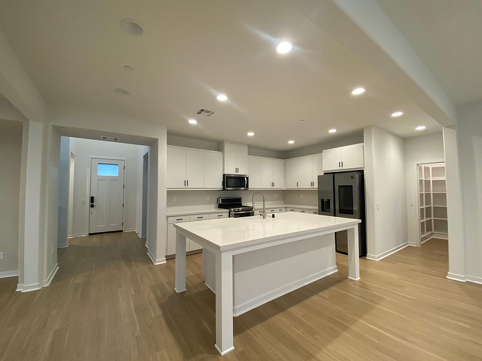 BIG KITCHEN ALL WITHE WITH HUGE KITCHEN ISLAND & PANTRY