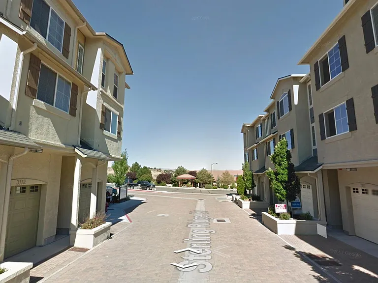 Google street view showing garage access to 3109 Sterling Ridge is on the right.