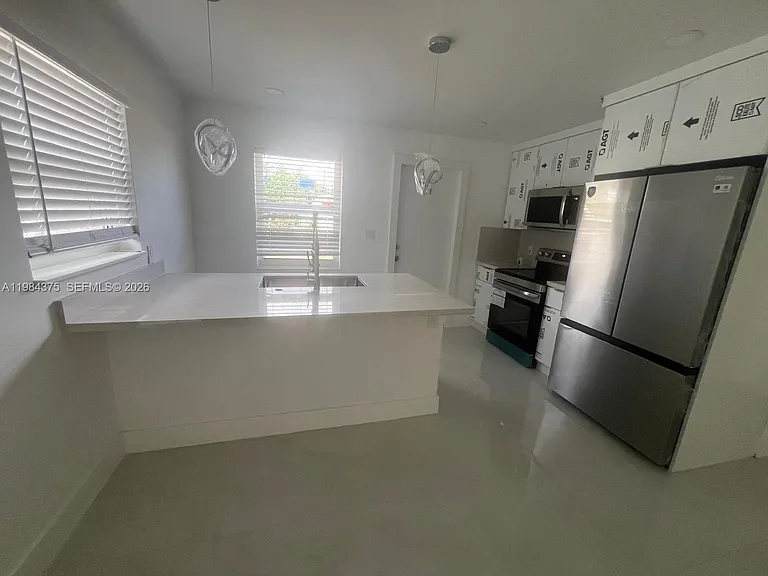 361 NW 16th St — Photo 14
