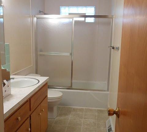Full bath with remodeled tile tub/shower surround.(Not pictu
