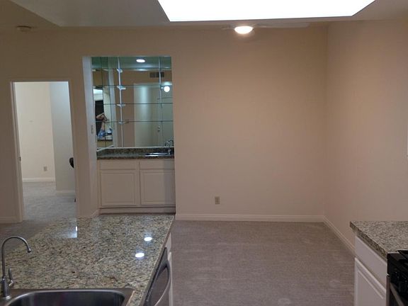 View of Dining Room and Wet Bar from Kitchen