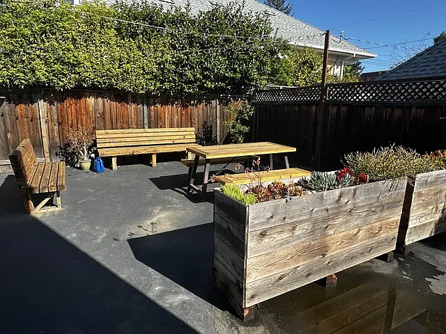 Shared patio with picnic table & benches