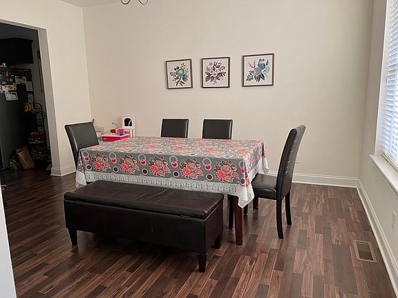 Formal
Dining with way to kitchen , right side from the entrance