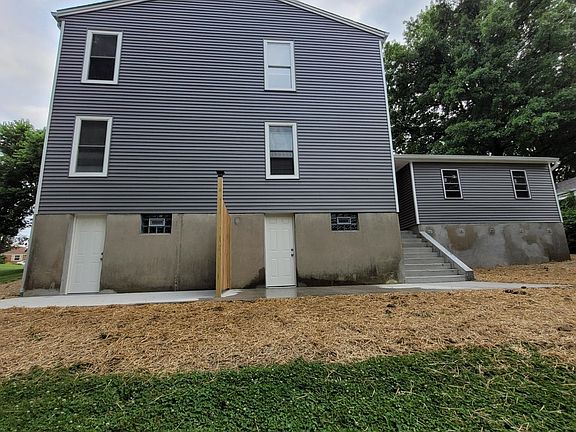 Back of house, 2nd floor back patio on the right with basement entrance