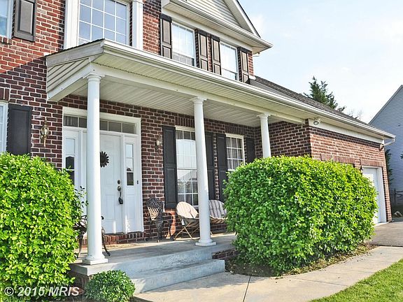Sit on the covered front porch