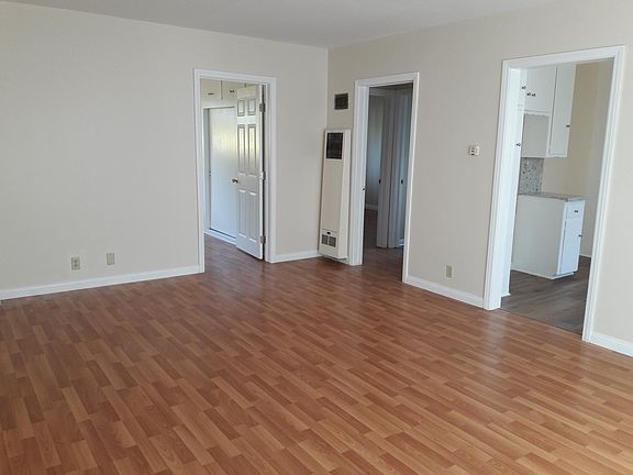 Living room, entrance to master bedroom, 2nd bedroom and bath, kitchen