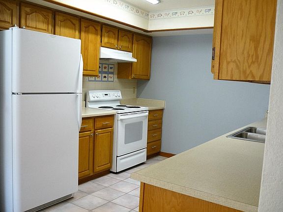 KITCHEN: Electric Stove/Refrigerator/Dishwasher/ Garbage Disposal