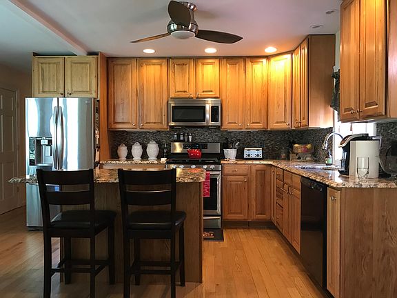 Updated Kitchen with Granite Countertops and Gas Range