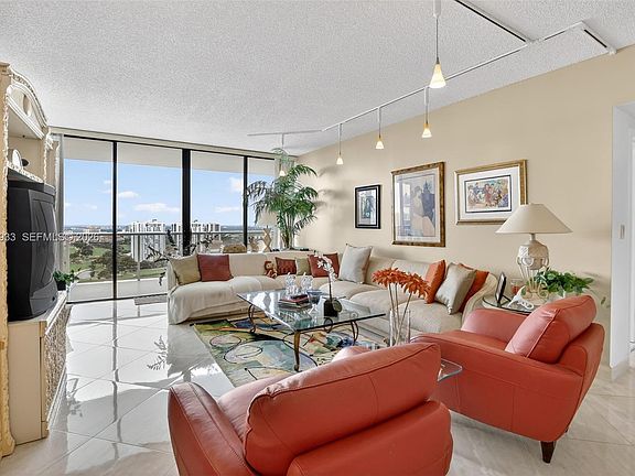 2nd image of 20281 E Country Club Dr APT 2403