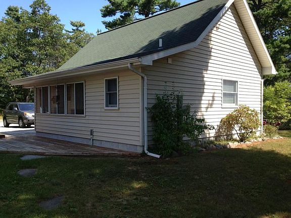 Here you have a 2 car garage with screened in porch, 3pc. bath and with additional space above garage. On side of the garage you have 220 electrical outlet for someone's camper.
