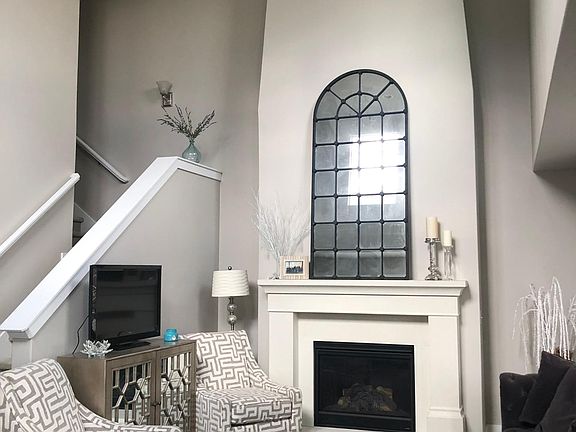 Main living area / fireplace/ 22 foot vaulted ceiling