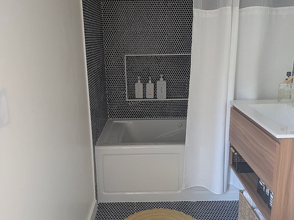 Gorgeous Tile and Deep Soaking Tub