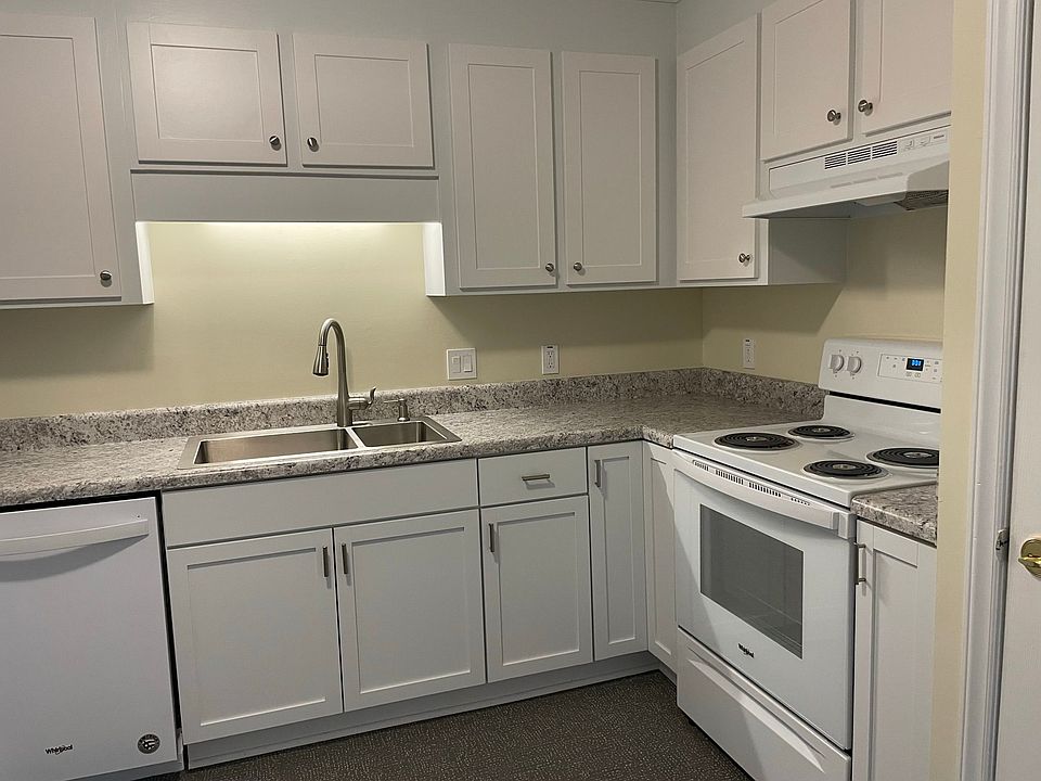Fall in love with this beautifully updated kitchen! Fresh white cabinets, new appliances, and stylish countertops create a bright, modern look. The spacious counters make meal prep easy, while plenty of cabinets keep everything organized. This clean, invi