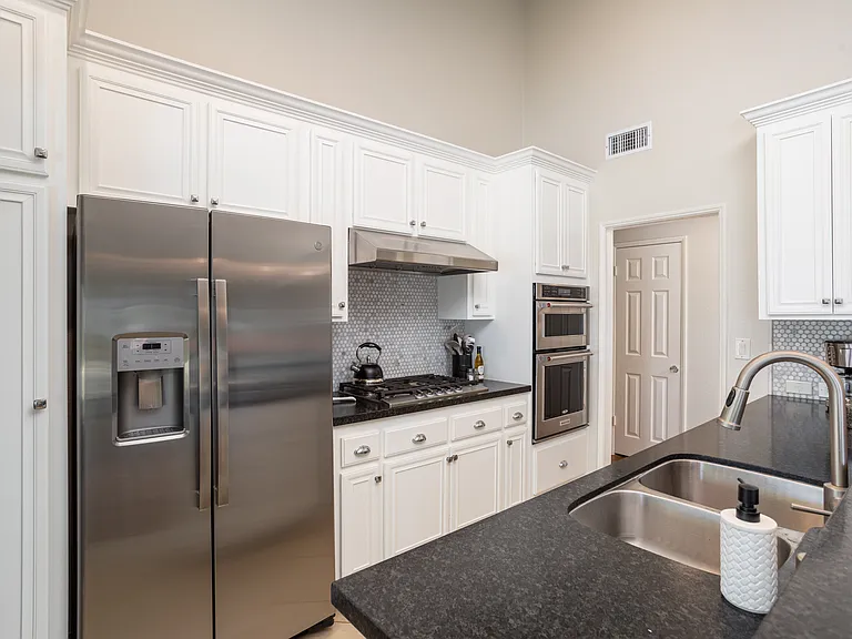 Beautiful Leather Angola Silver Black granite, counters.