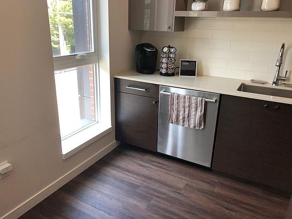 Rest of kitchen with dishwasher