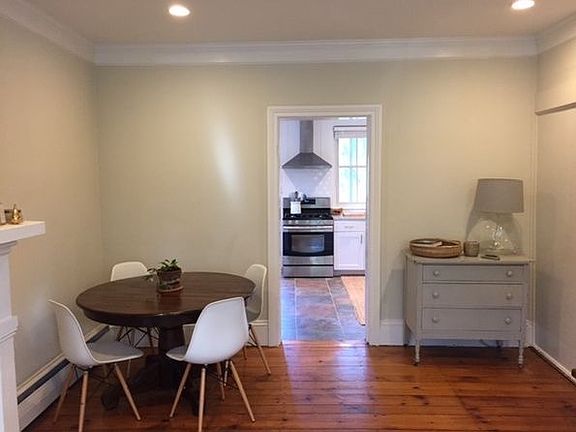 Dining area with entrance to kitchen
