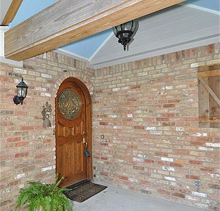You will see many great architectural features throughout the home including the arched entry...