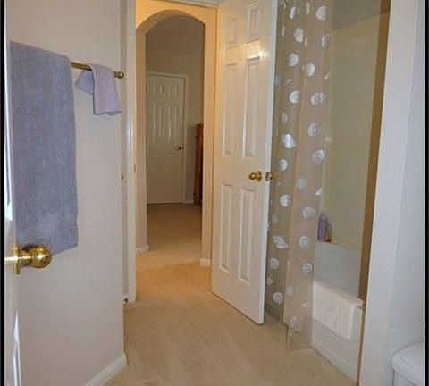 Connecting bathroom upstairs tub shower area.