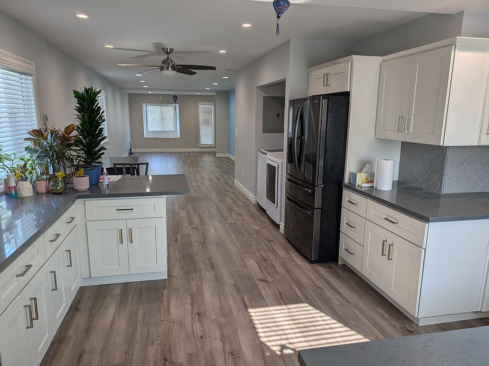Kitchen, dining area, and living room