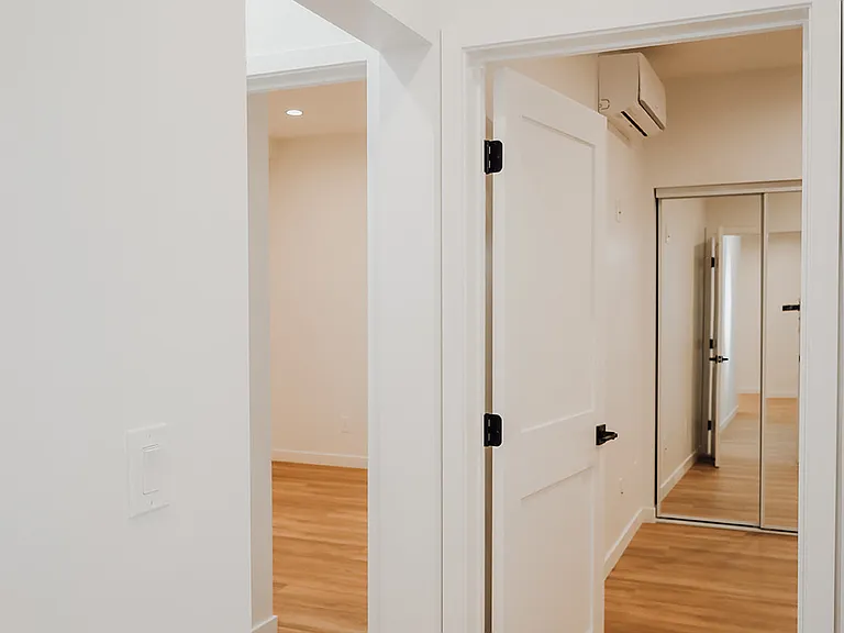 Hall to master bath - Same layout in both units