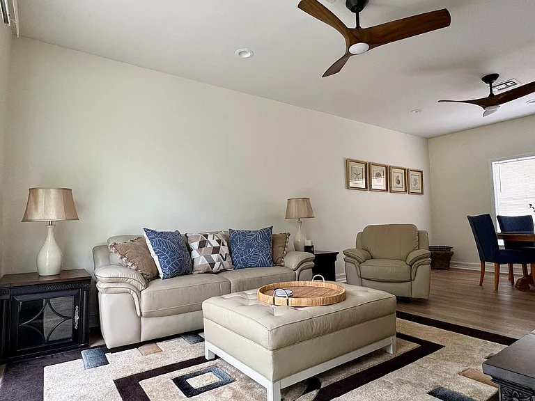 Spacious Living Rm w/ large quiet fans keeps everything breezy cool!