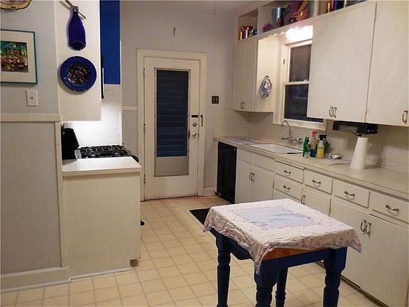 Roomy kitchen with lots of storage in cabinets.