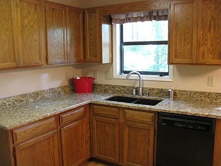 Black, Undermount Sink Matches Granite and Black Appliances