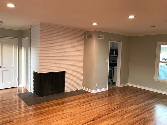 Dining area on the right, fireplace on the left.