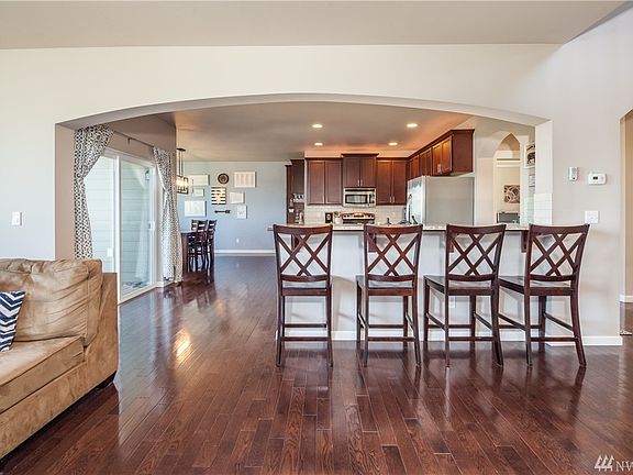 Living room flows to kitchen