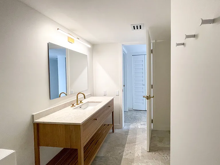 Clean lines throughout all spaces including the guest bathroom