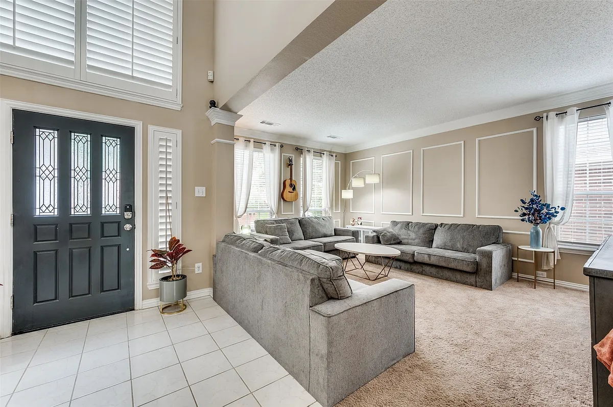 Entry foyer with white tile flooring - 2106 Hunter Place Ln