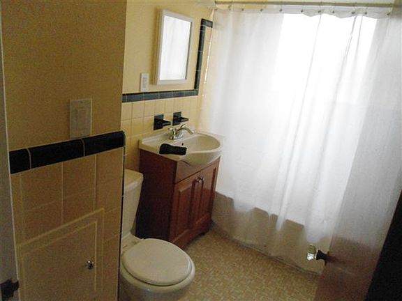 vintage ceramic bathroom with new vanity
