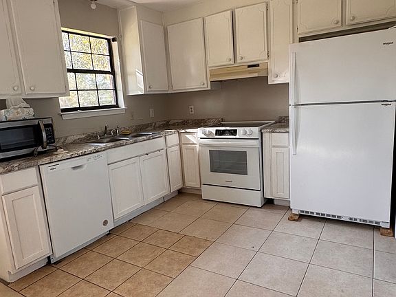 Kitchen with brand new appliances. Lots of storage.