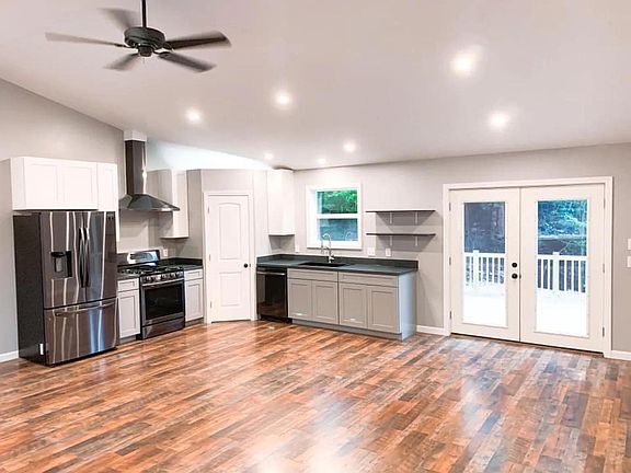 Main open concept living level: *NEW* 2021: Kitchen island with storage and seating