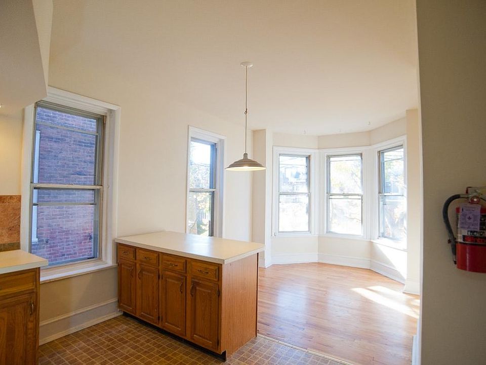 Large kitchen and dining and living room (shown here unfurnished)