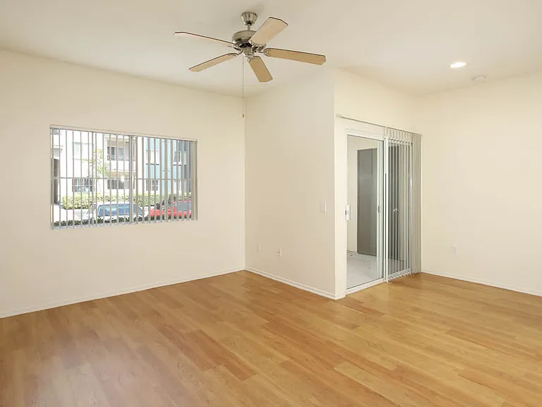 Living Room with Balcony and Hard Surfaced Flooring