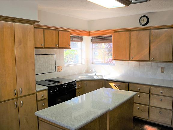 Nice kitchen with plenty of storage space. Island is a nice size.