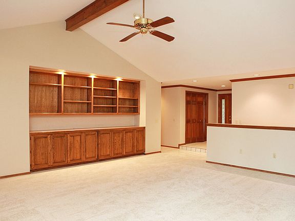 Great Room with beautiful stained wood built-ins