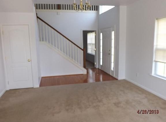 LIVING ROOM AND FOYER