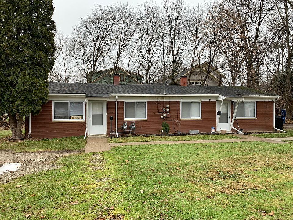 Front of the building. This building is surrounded by expensive single-family homes in the Eberwhite neighborhood. Excellent walking area, convenient to downtown and campus.