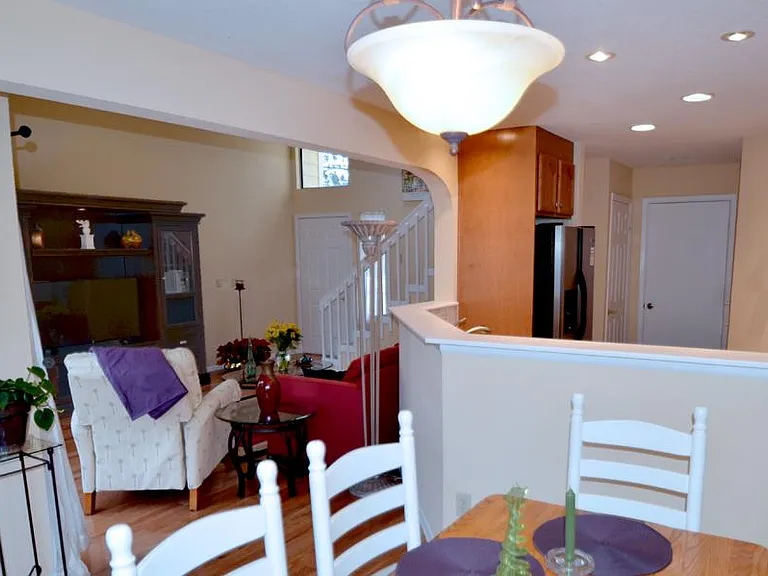 Separate dining area overlooks the living room