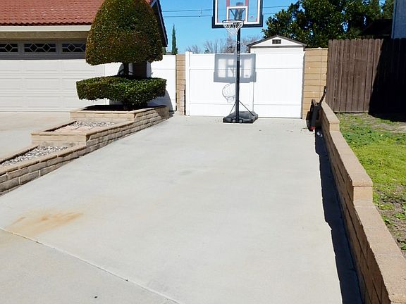 Concrete pad near driveway