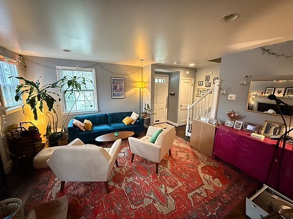 Living room (FYI, some of the furniture may be available for sale by current tenant)