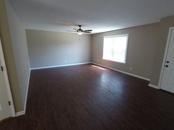 Vertical blinds in the front window.